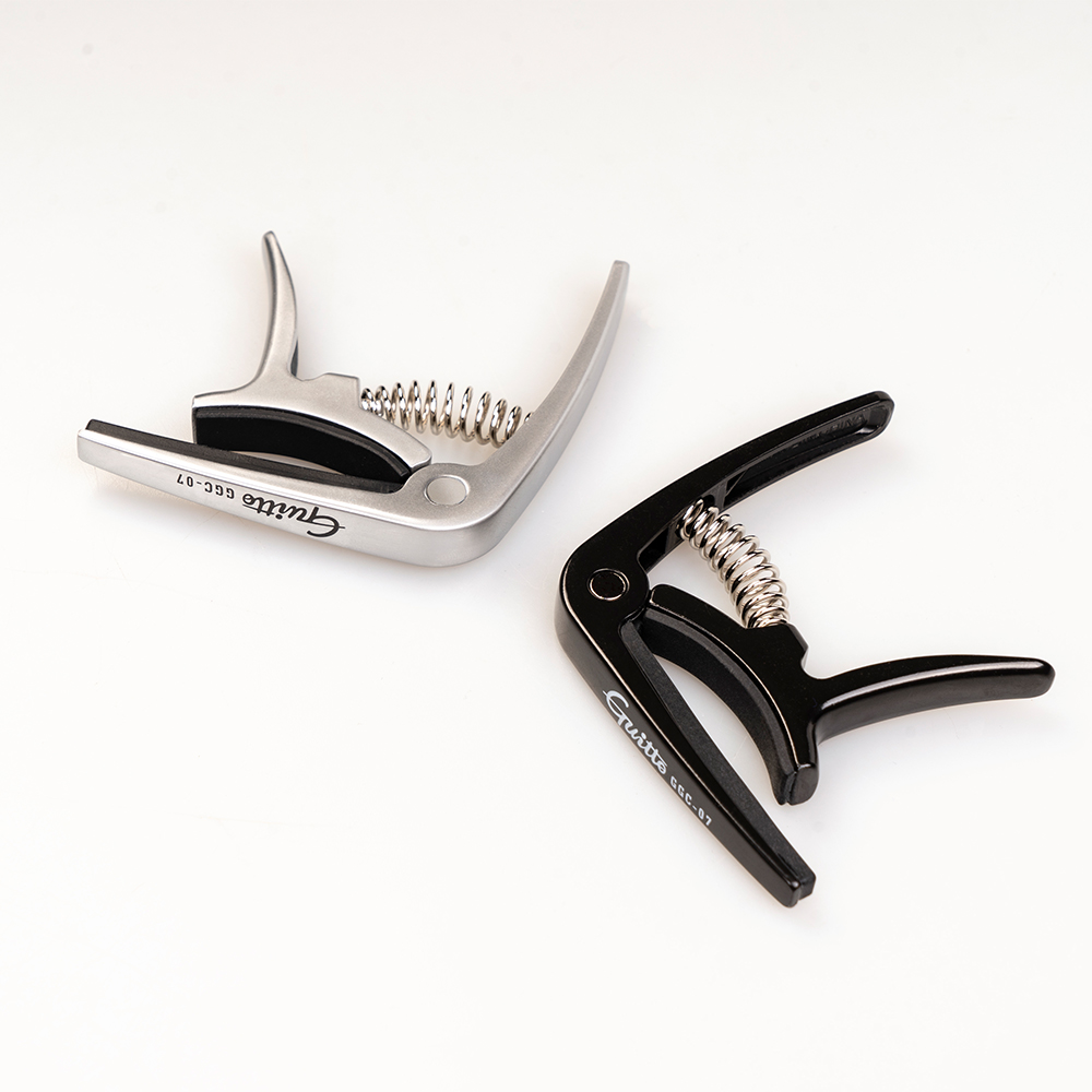 GUITTO GGC-07 Ukulele Capo Qui - Musical Instrument Art recension och pris